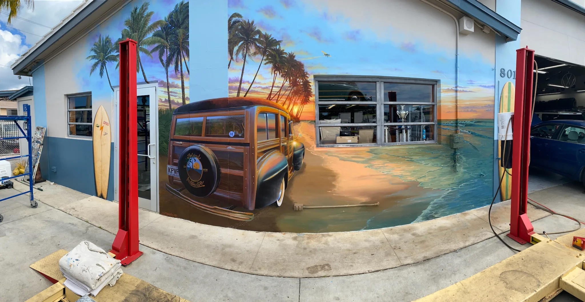 Front of the shop with mural by Jarrett Stinchcomb